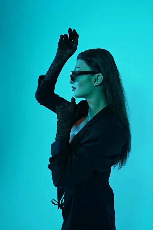 Black Suit — colour-gel studio fashion portrait by photographer Soner Erdoğan