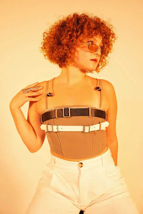 Curls — colour-gel studio fashion portrait by photographer Soner Erdoğan